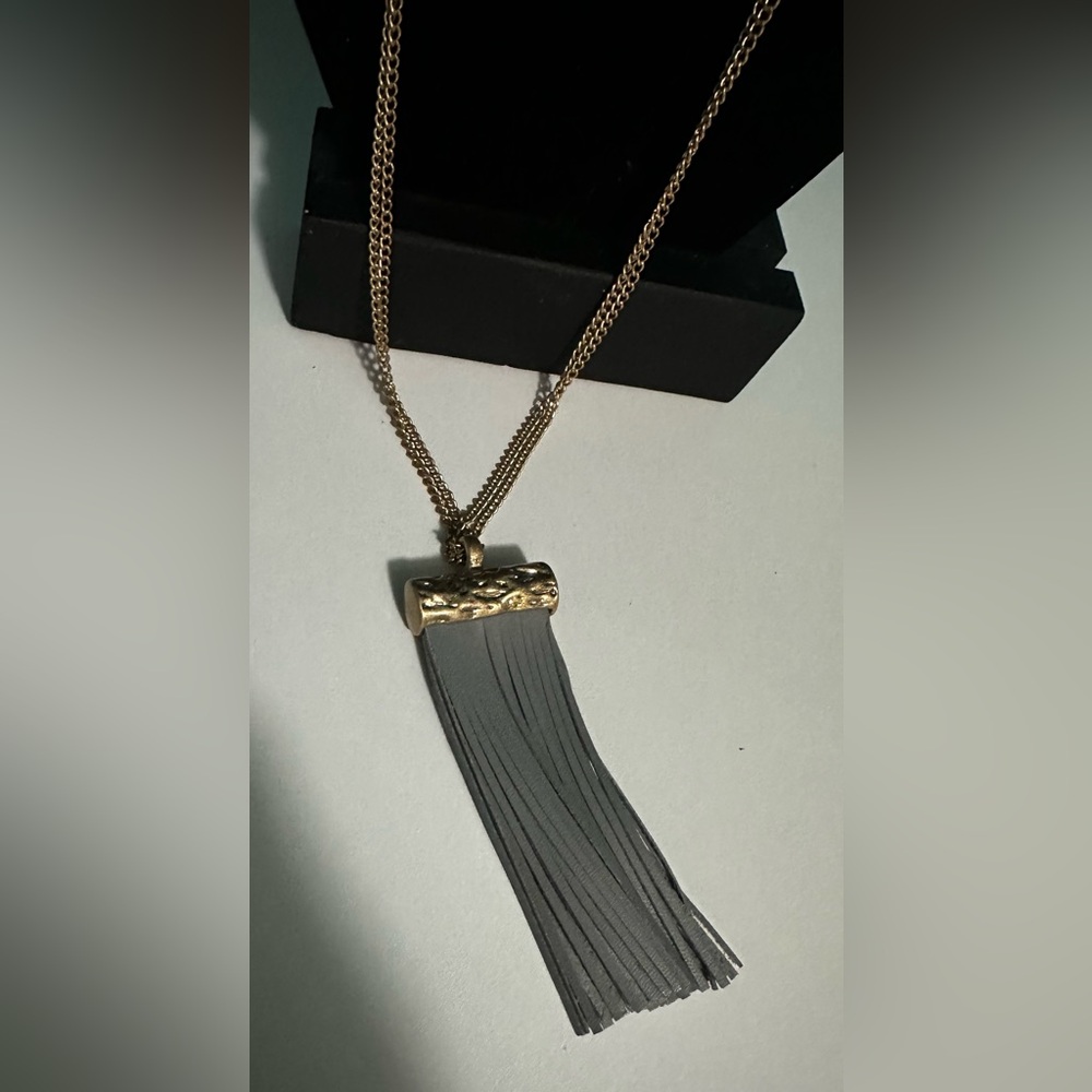 2/$30PLUNDER LONG GOLD NECKLACE W/A GREY FAUX LEATHER DANGLING PENDANT BRAND NEW